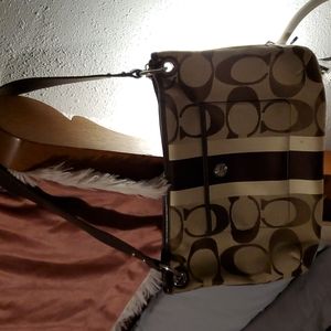 Coach purse about 10inches across x 8inches